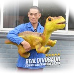 Animatronic Puppet Manufacturer - Handmade Holding Baby Dinosaur