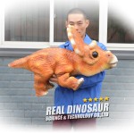 Animatronic Puppet Manufacturer - Handmade Holding Baby Dinosaur