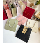 Clothes Packaging Bag Manufacturer - Custom Recycled Ribbon Handle Shopping Paper Bag