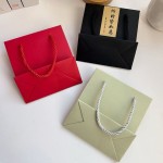 Jewelry Paper Bag Manufacturer - Custom Rope Handle Fashion Gift Package Surface Texture