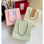 Art Paper Jewelry Bag Manufacturer - Custom Blank Texture Handheld Bag with Rope