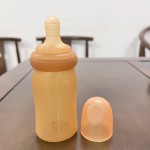 Spoon Feeder Factory - BPA Free Liquid Silicone 2 in 1 Rice Bottle