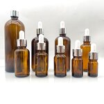 Glass Bottle Manufacturer - Custom Stone Paint Spots Application