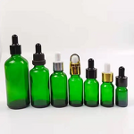 Glass Bottle Manufacturer - Custom Stone Paint Spots Application