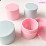 批发各种型号的蓝色和粉红色的塑料化妆品罐眼霜空乳液包装