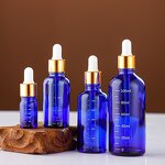 Rubber Head Dropper Amber Glass Bottle Manufacturer - OEM 5-100mL Cosmetic Essential Oil
