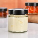 Round Glass Honey Jars Manufacturer - OEM Straight Side 50-100ml Clear Food Container