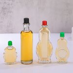 Safflower Oil Empty Bottle Factory - OEM Transparent 8-54ml Windproof with Green Cover