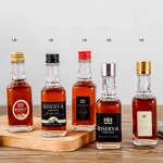 Mini Glass Liquor Bottles Manufacturer - OEM 50ml 1.7 oz Small Wine Bottles with Lids