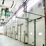 Steel Garage Door Factory - OEM/ODM Modern Designed Automatic Industrial Vertical Windproof