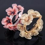 Banana Clip Factory - OEM Custom Embroidered Flowers & Twist Design