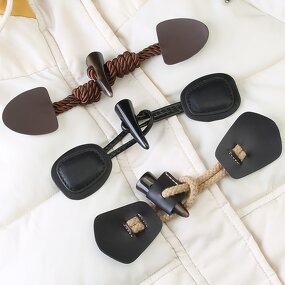 PU Leather Button Manufacturer - Sewing Toggle Buckle Down Jacket