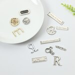 Garment Metal Label Manufacturer - Factory Design Custom Embossed Brand Logo Sew in