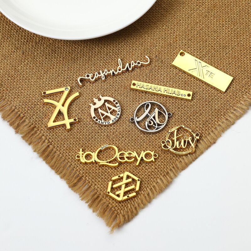 Garment Metal Label Manufacturer - Factory Design Custom Embossed Brand Logo Sew in