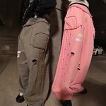 Men's Casual Pants Manufacturer - OEM Fashion Loose Sports Stripe Stitching Ripped