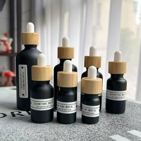 Glass Essential Oil Bottle Manufacturer - 15ml 30ml 50ml 100ml Black Matte Glass Dropper with Black Bamboo and Natural