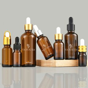 Glass Dropper Bottle Manufacturer - In Stock 30ml 50ml 100ml Transparent Amber Glass Essential Oil with Gold and Silver