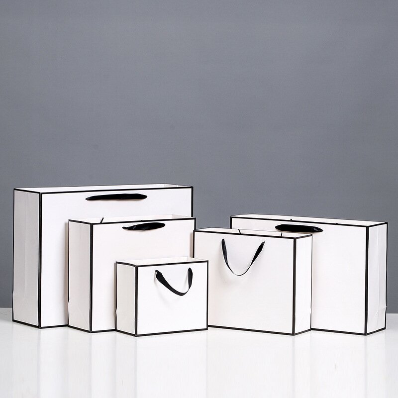 Cardboard Shopping Paper Bag Manufacturer - YC Luxury Eco-Friendly Art Gift Women's Clothing Packaging White With Black Line Edges