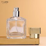Custom 70ml Square Glass Perfume Bottle with Gold Cap Cosmetic Pump Sprayer for Containers Packed in Cartons