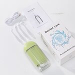 Mini Electric Water Flosser - 4 Nozzles IPX7 Waterproof Detachable Travel Tool