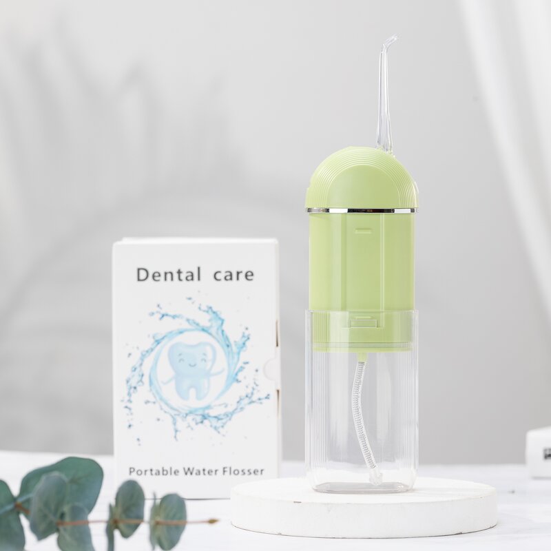 Mini Electric Water Flosser - 4 Nozzles IPX7 Waterproof Detachable Travel Tool