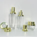 Skincare Bottles Manufacturer - Transparent Glass with Gold Cap 30g to 120g for Cream & OEM