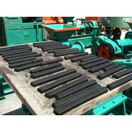 Charcoal briquette machine