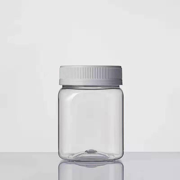蜂蜜罐工厂-100g-900g空透明PET塑料罐批发带白盖