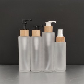 Bamboo Pump Bottle Manufacturer - 60ml 100ml 2oz Glass Lotion Spray Bottle with Bamboo Lid