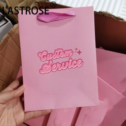 纸手提袋厂家-代工奢华粉色纸手提袋睫毛包装袋带手柄批发