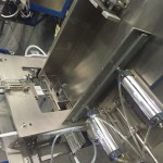 婴儿纸尿裤包装机供应商-半自动装袋